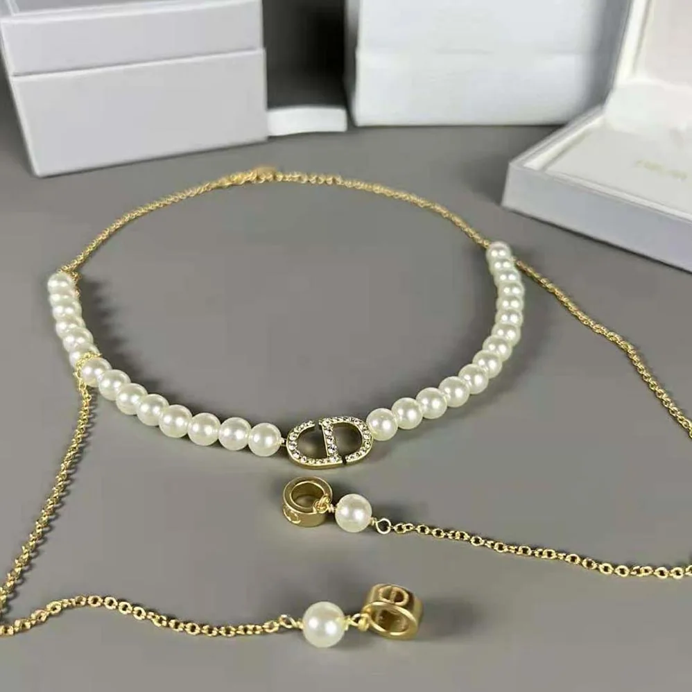 Dior Petit CD Necklace for Headphones Gold for Women in Finish Metal Dior Petit CD Necklace for Headphones Gold for Women in Finish Metal