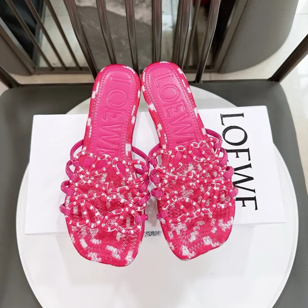 Loewe Petal Anagram Slide in Embroidered Canvas for Women in Orchid Loewe Petal Anagram Slide in Embroidered Canvas for Women in Orchid