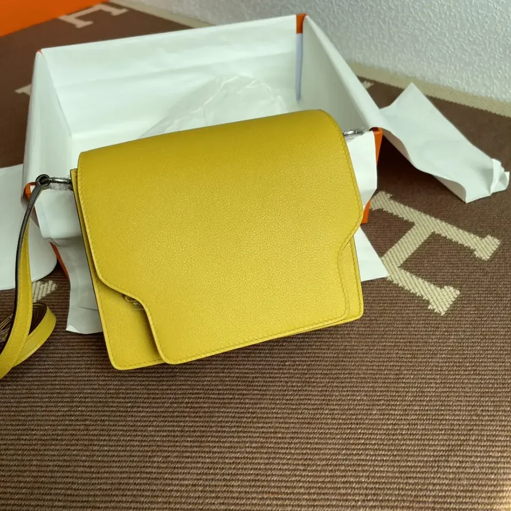 Hermes Roulis Mini Bag in Evercolor Calfskin for Women in Yellow/Gold Hermes Roulis Mini Bag in Evercolor Calfskin for Women in Yellow/Gold