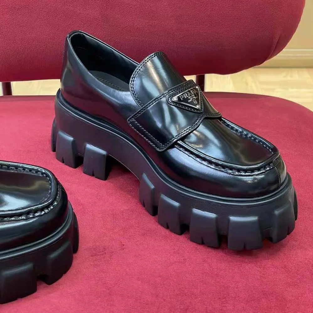 Prada Brushed Leather Monolith Loafers for Unisex in Black