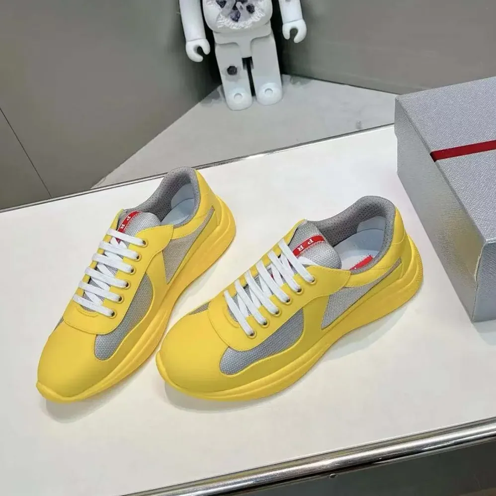 Prada America's Cup Soft Rubber and Bike Fabric Sneakers for Unisex in Yellow Prada America's Cup Soft Rubber and Bike Fabric Sneakers for Unisex in Yellow