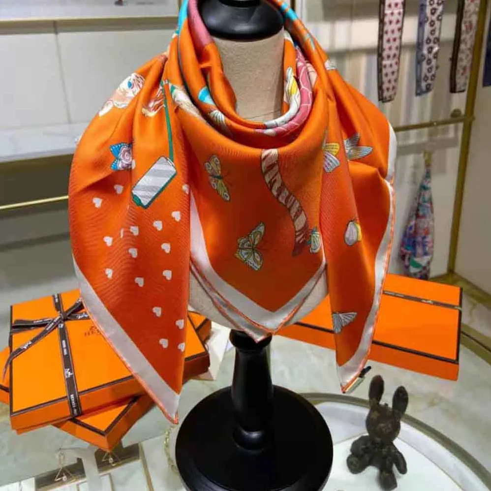 Hermes Hermes Story Scarf 90 in Silk Twill with Hand-Rolled Edges for Women in Orange