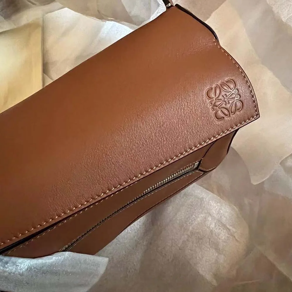 Loewe Small Puzzle Bumbag in Classic Calfskin for Unisex in Brown