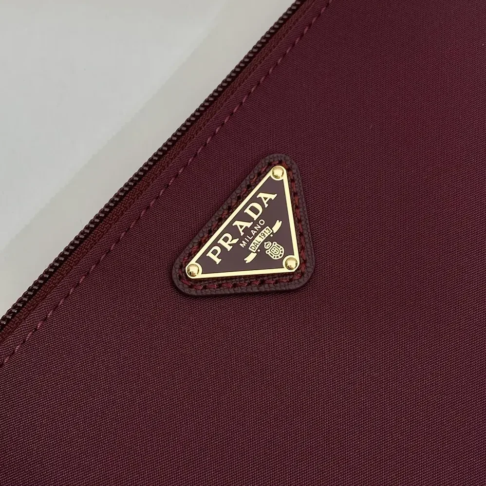 Prada Re-Nylon Pouch Enameled Metal Triangle Logo for Women Prada Re-Nylon Pouch Enameled Metal Triangle Logo for Women