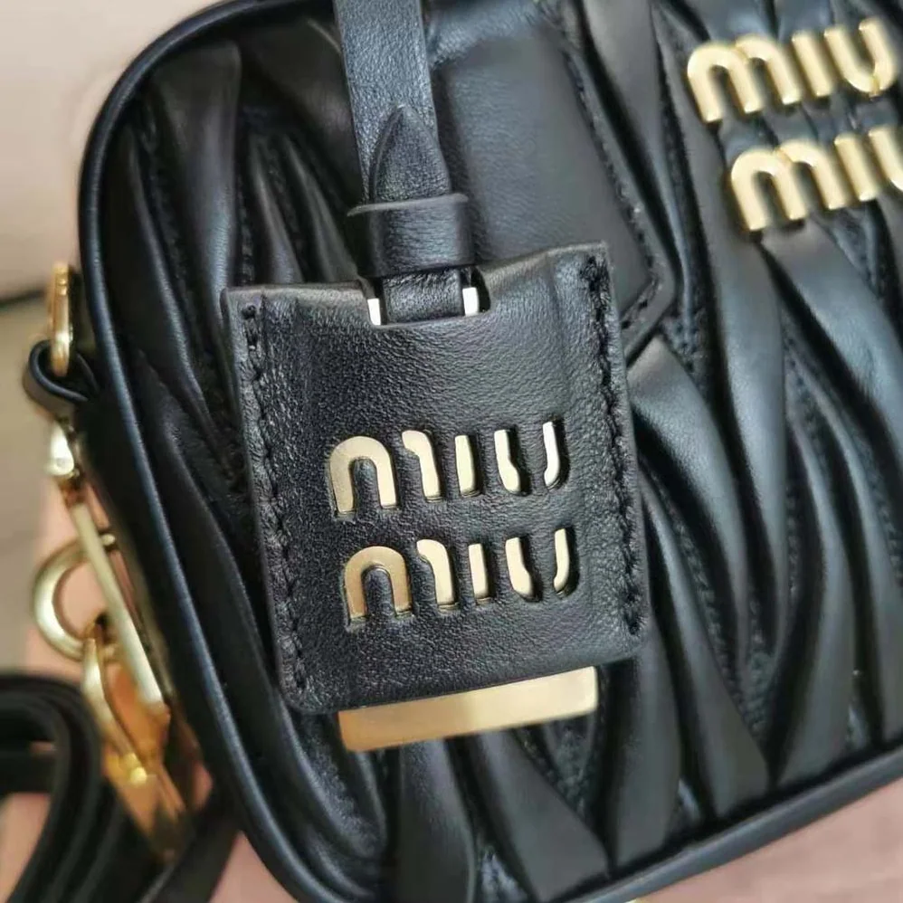 Miu Miu Matelassé Nappa Leather Top-Handle Bag for Women in Black