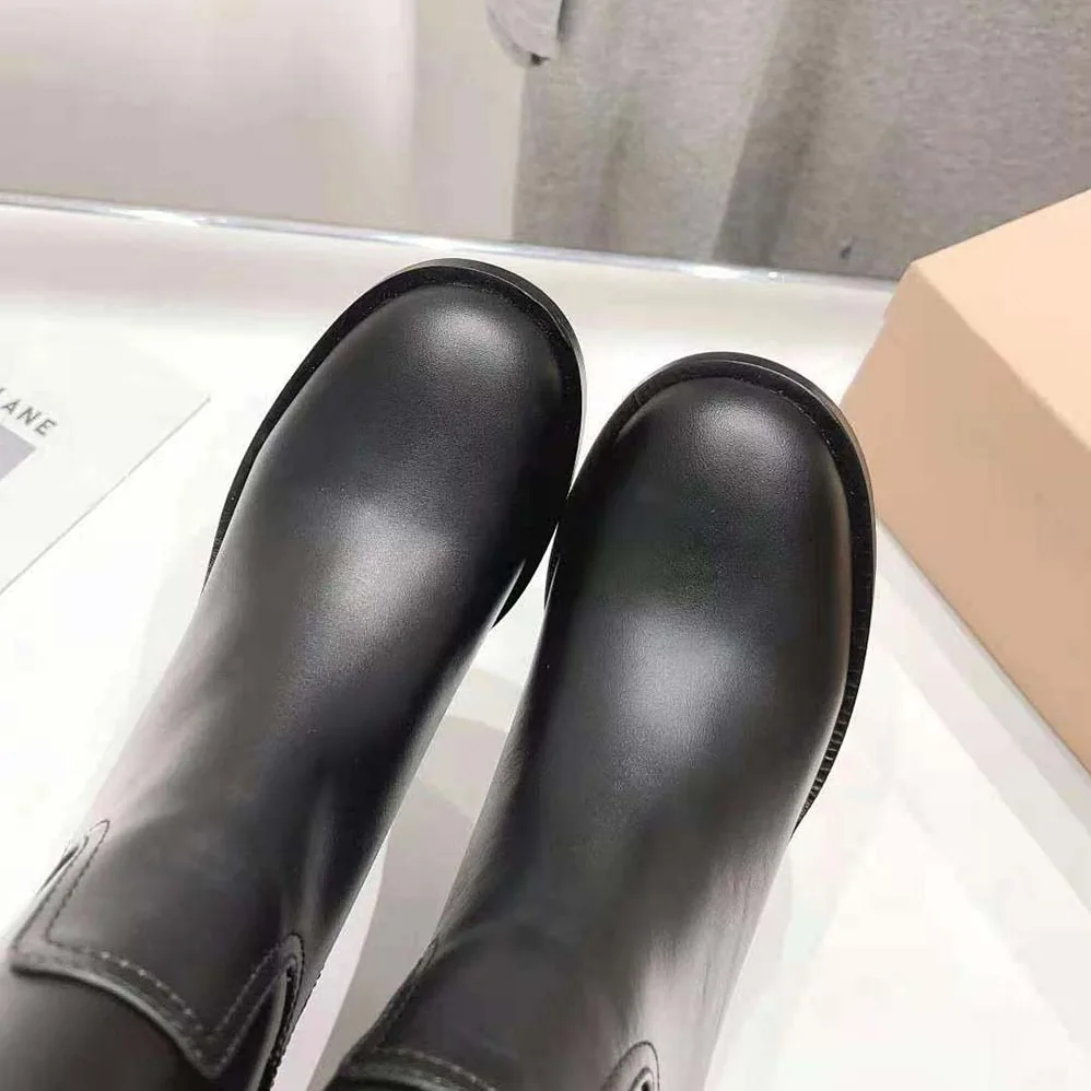 Miu Miu Leather Booties with Hot-stamped Logo for Women in Black
