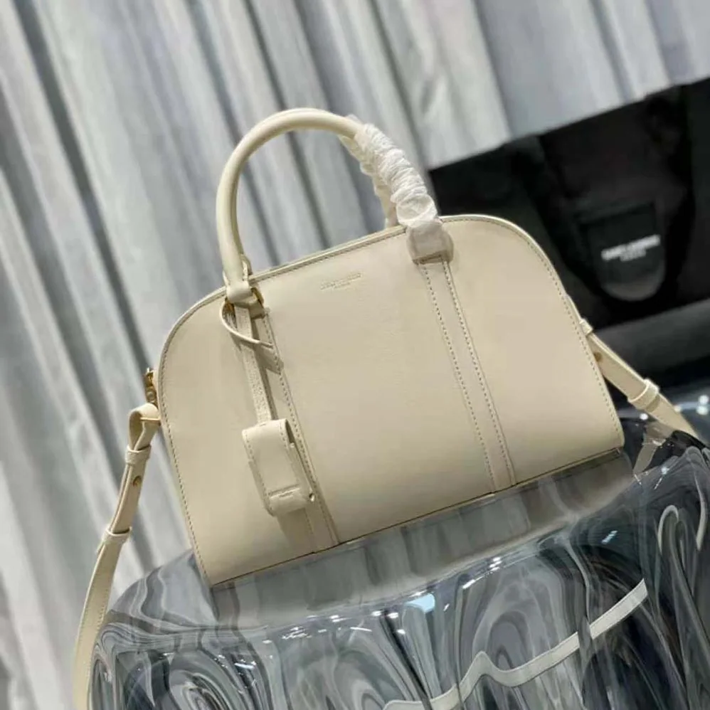 Saint Laurent YSL Lock Baby Duffle in Smooth Leather for Women in White Saint Laurent YSL Lock Baby Duffle in Smooth Leather for Women in White