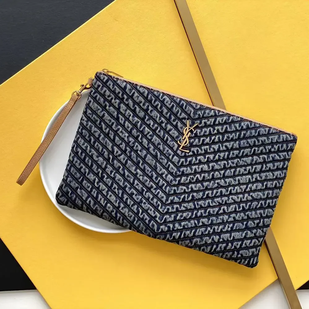 Saint Laurent YSL Monogram Tablet Pouch in Quilted Vintage Denim and Suede for Women Saint Laurent YSL Monogram Tablet Pouch in Quilted Vintage Denim and Suede for Women