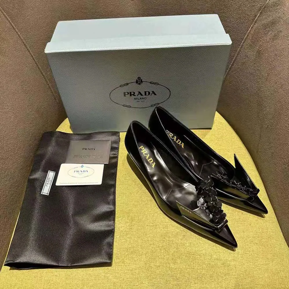 Prada Brushed Leather Pumps with Floral Appliqués for Women in Black