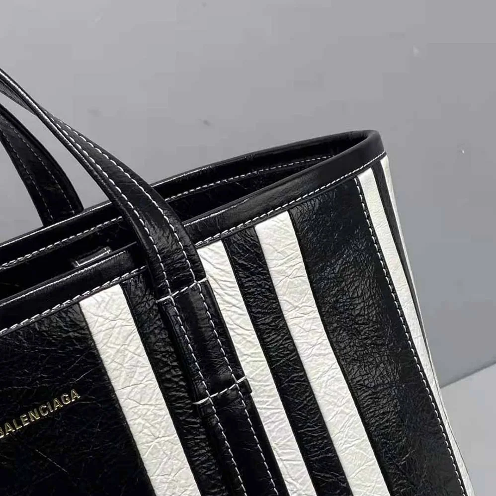 Balenciaga Barbes Medium East-West Shopper Bag for Women in Black Balenciaga Barbes Medium East-West Shopper Bag for Women in Black
