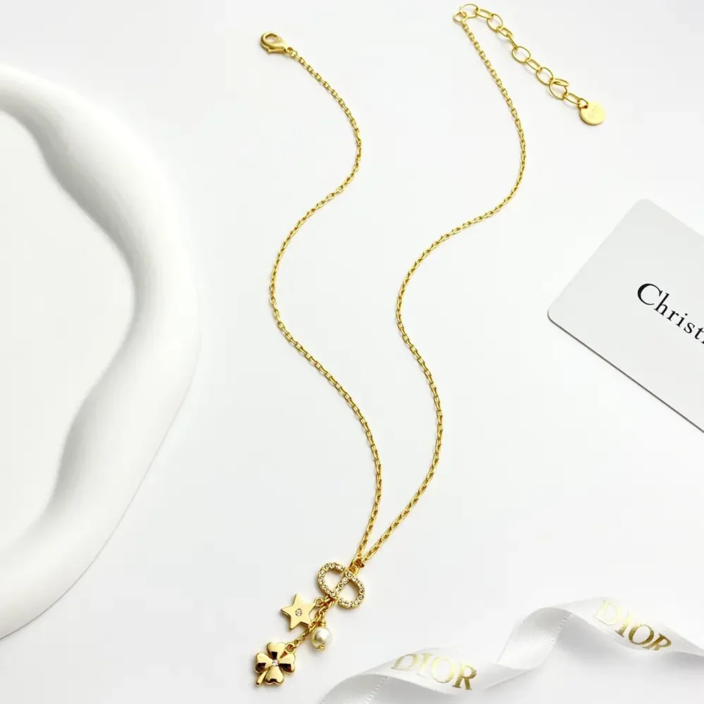 Dior Petit CD Lucky Charms Necklace Gold-Finish Metal with a White Resin Pearl and Silver for Women in Tone Crystals Dior Petit CD Lucky Charms Necklace Gold-Finish Metal with a White Resin Pearl and Silver for Women in Tone Crystals