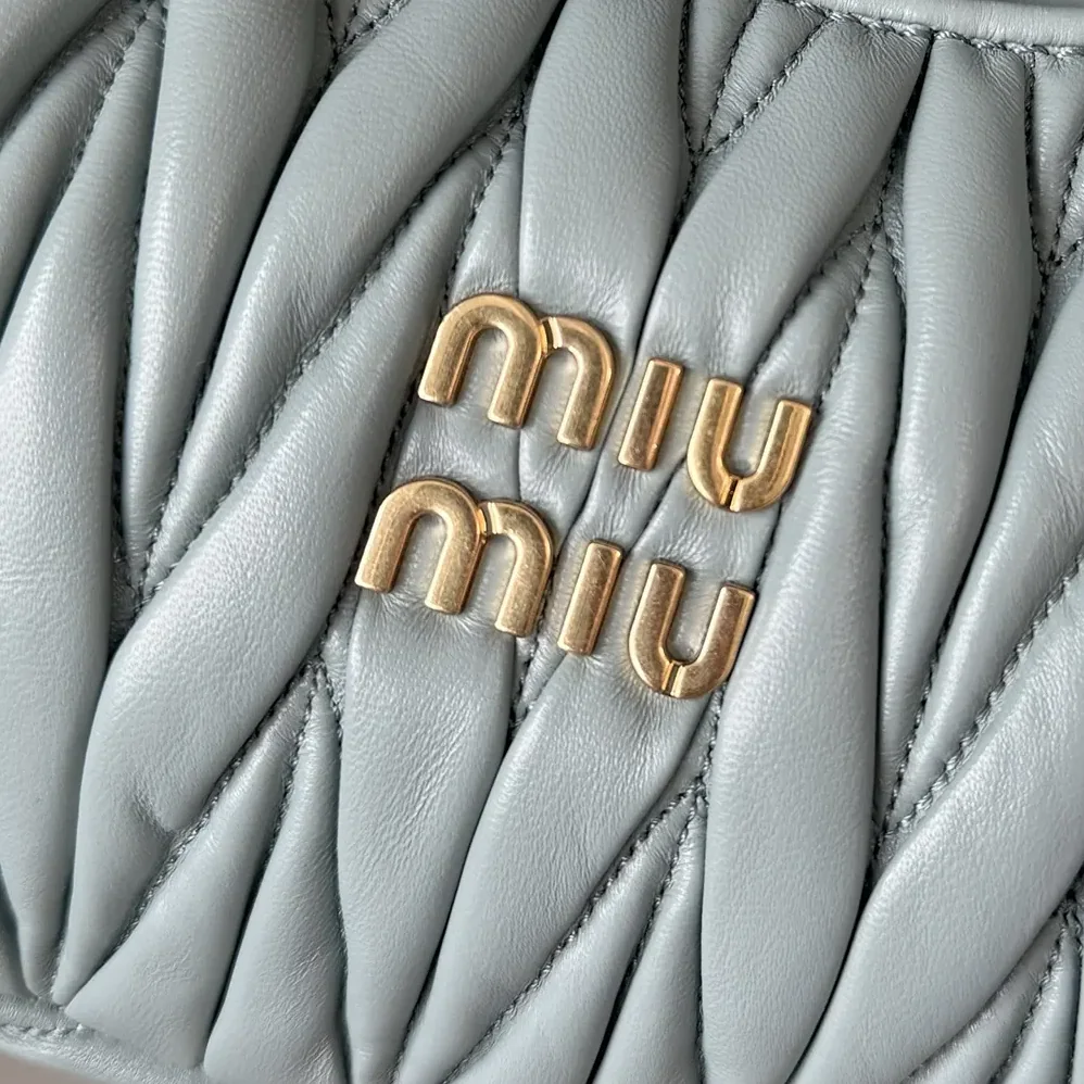 Miu Miu Wander Matelassé Nappa Leather Hobo Bag for Women in Powder Blue Miu Miu Wander Matelassé Nappa Leather Hobo Bag for Women in Powder Blue