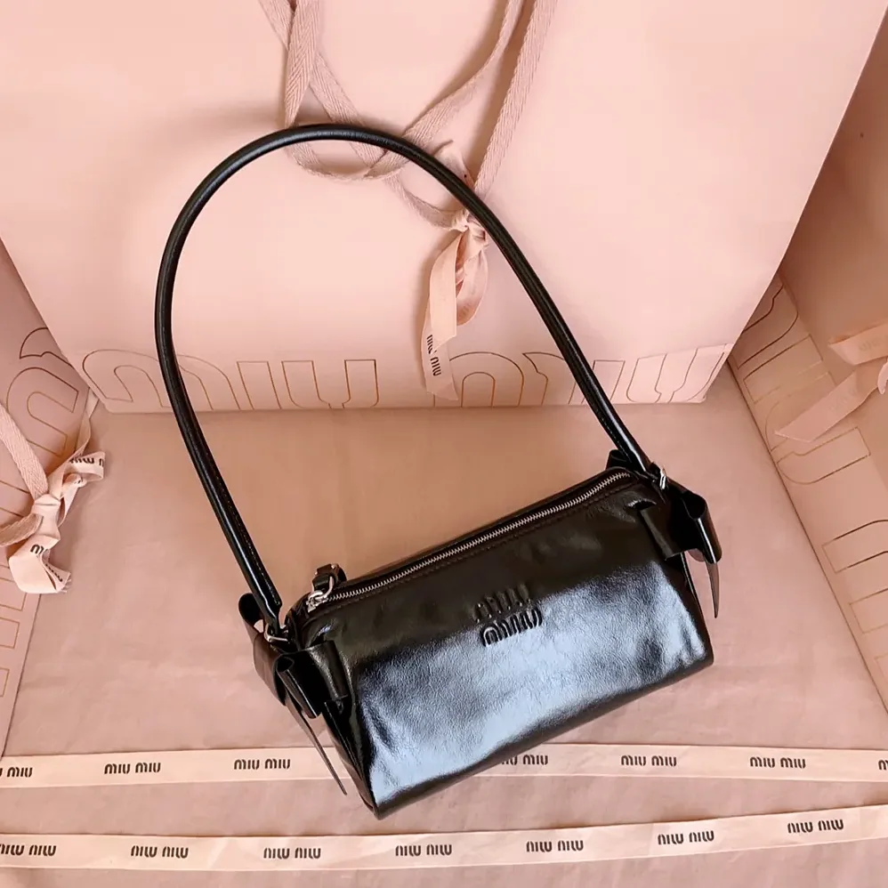 Miu Miu Shiny Leather Pouch for Women in Black Miu Miu Shiny Leather Pouch for Women in Black