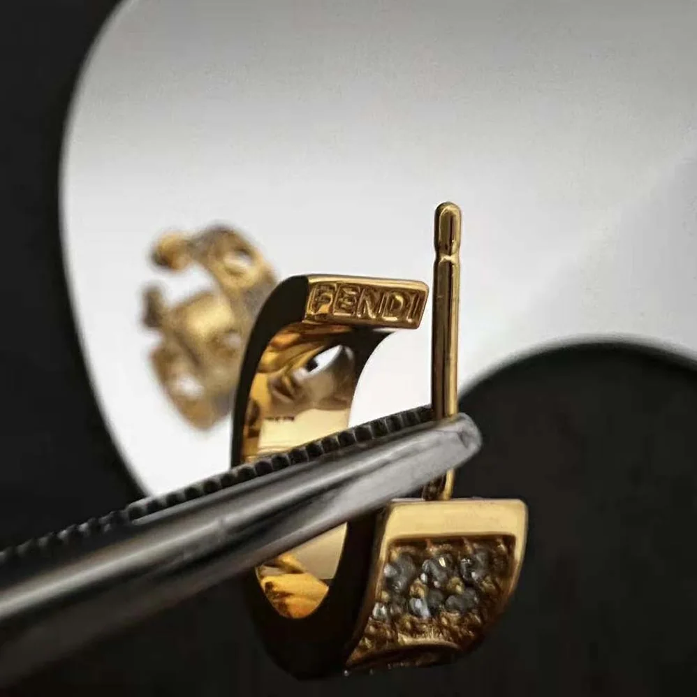 Fendi Small Hoop Earrings with F is Fendi Motif Gold for Women in coloured Fendi Small Hoop Earrings with F is Fendi Motif Gold for Women in coloured