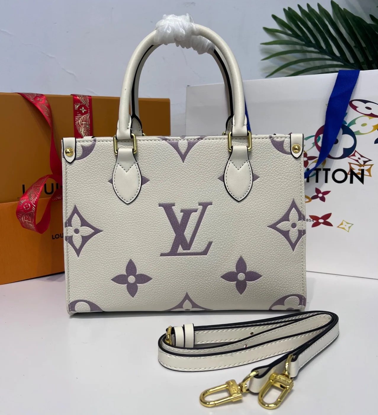 Louis Vuitton Onthego PM Tote Bag in Grey/Beige Gold Hardware