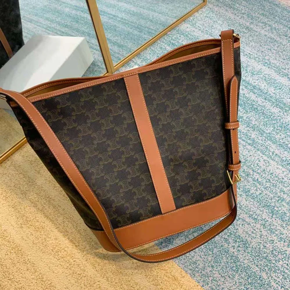 Celine Medium Bucket in Triomphe Canvas for Women in Brown Celine Medium Bucket in Triomphe Canvas for Women in Brown