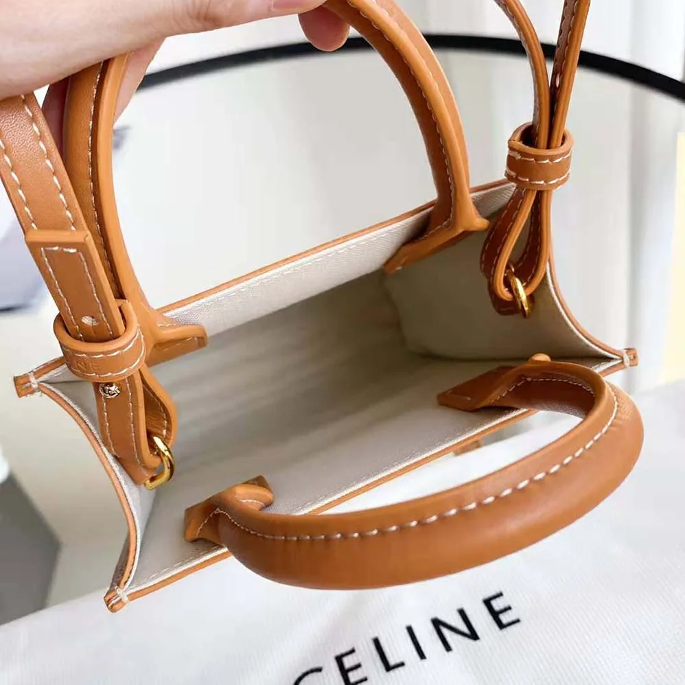 Celine Mini Vertical Cabas Celine in Textile with Celine Print and Calfskin for Women in White Celine Mini Vertical Cabas Celine in Textile with Celine Print and Calfskin for Women in White