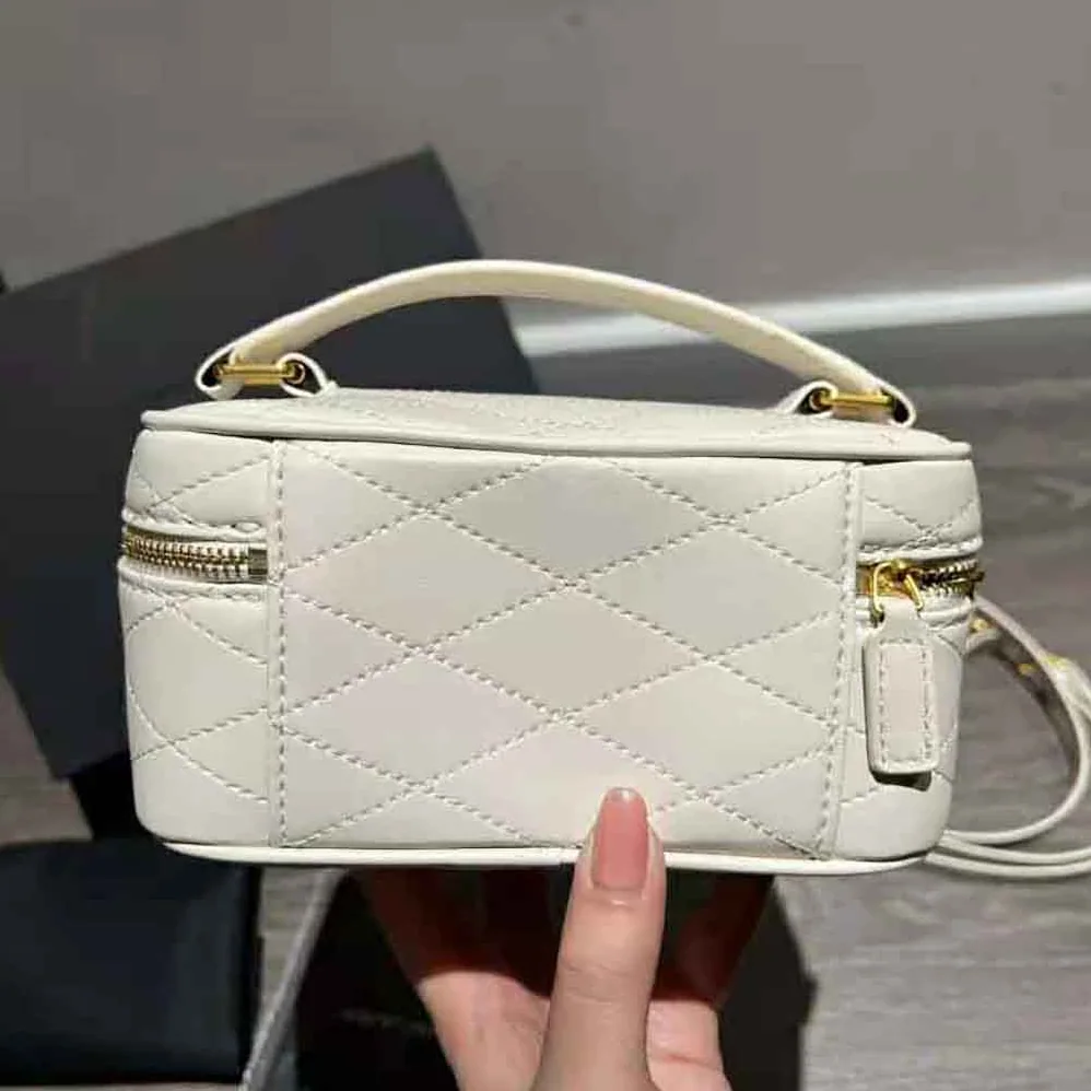 Saint Laurent YSL Mini Saint Laurent Vanity Case in Quilted Lambskin for Women in White Saint Laurent YSL Mini Saint Laurent Vanity Case in Quilted Lambskin for Women in White