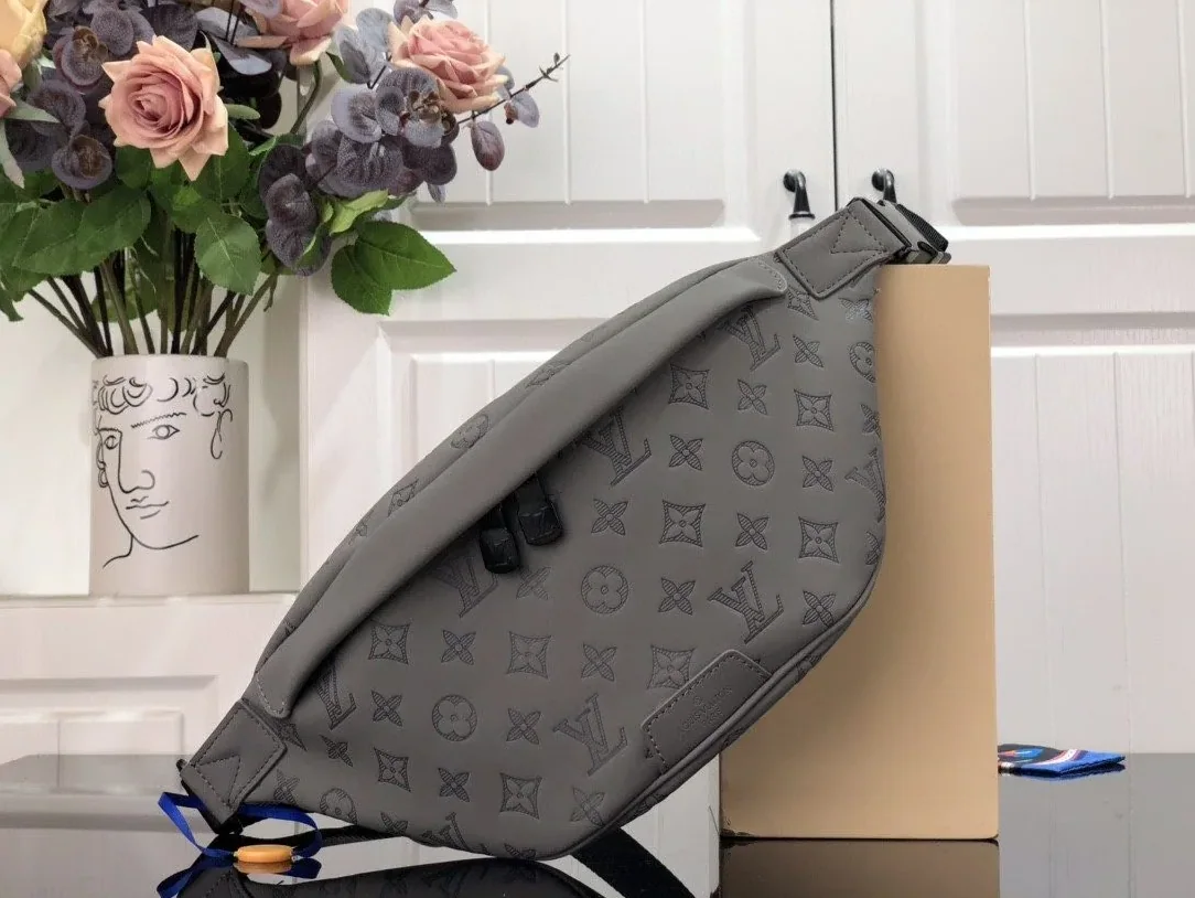 Louis Vuitton Discovery Bumbag in Grey Black Hardware Louis Vuitton Discovery Bumbag in Grey Black Hardware