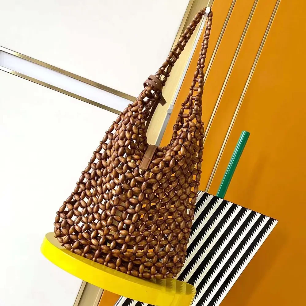 Saint Laurent YSL Le 5 A 7 Large in Wood Beads for Women in Brwon