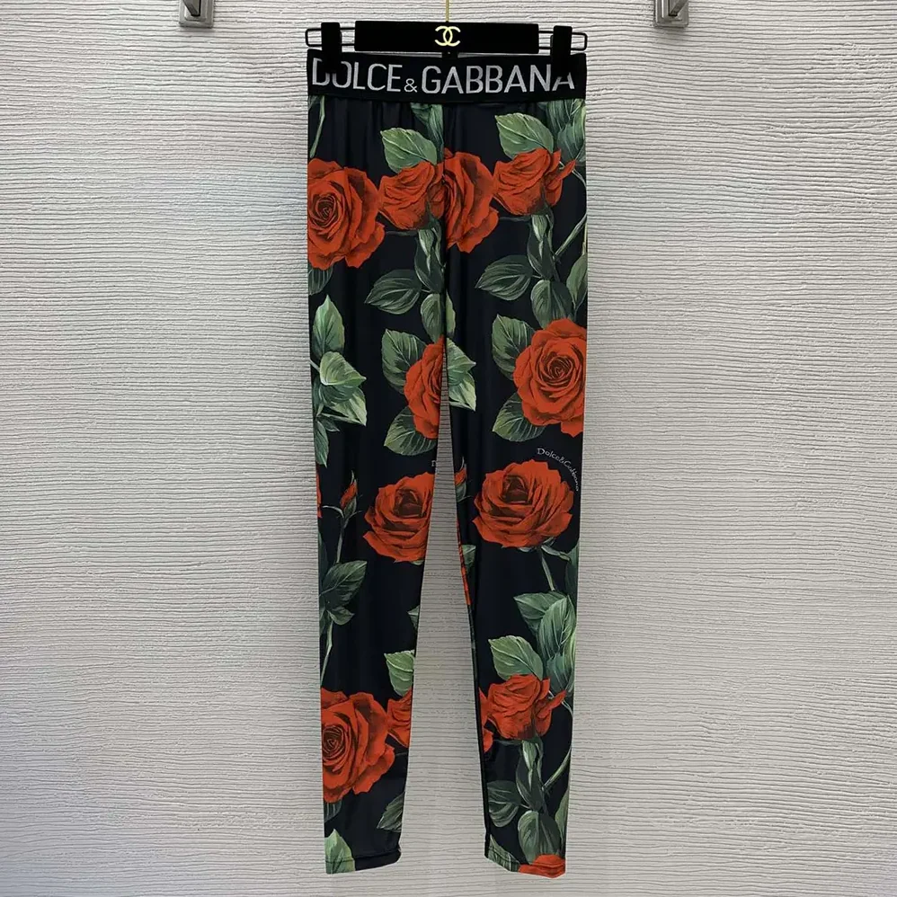 Dolce Gabbana D&G Spandex 2-piece Swimsuit with Rose Print Over a Black Background for Women Dolce Gabbana D&G Spandex 2-piece Swimsuit with Rose Print Over a Black Background for Women