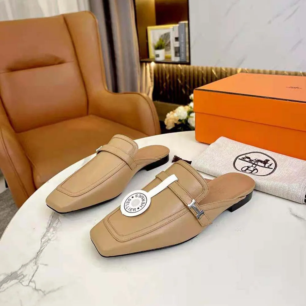 Hermes Groupie Mule in Goatskin with Miniature Palladium-Plated Paris Buckle for Women in Beige