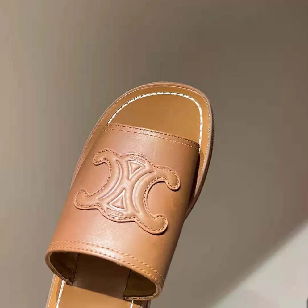 Celine Clea Triomphe Slide in Calfskin & Vegetal Tanning for Women Celine Clea Triomphe Slide in Calfskin & Vegetal Tanning for Women