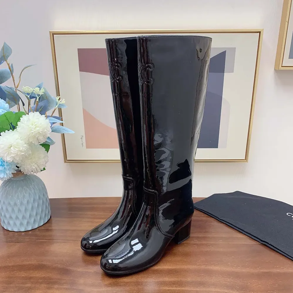 Celine Les Bottes Celine Triomphe High Boot in Patent Calfskin for Women in Black
