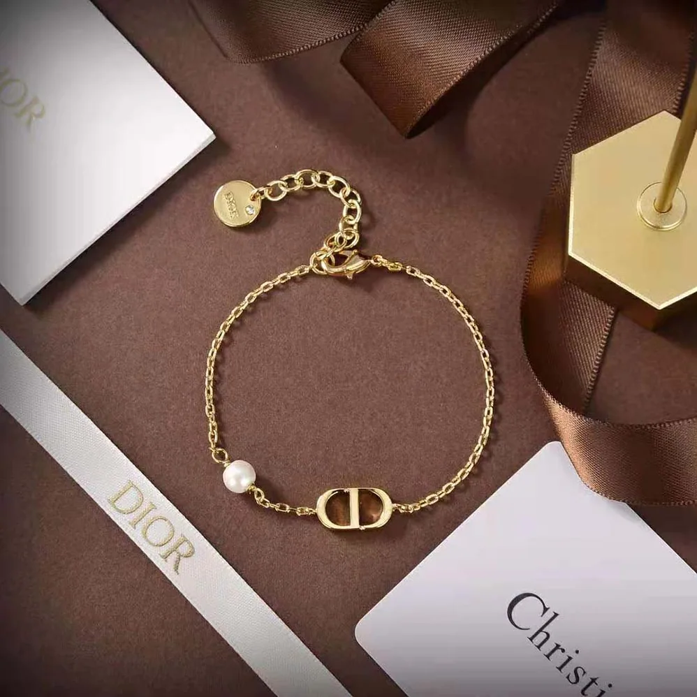 Dior Petit CD Bracelet Gold-Finish Metal with a White Resin Pearl for Women