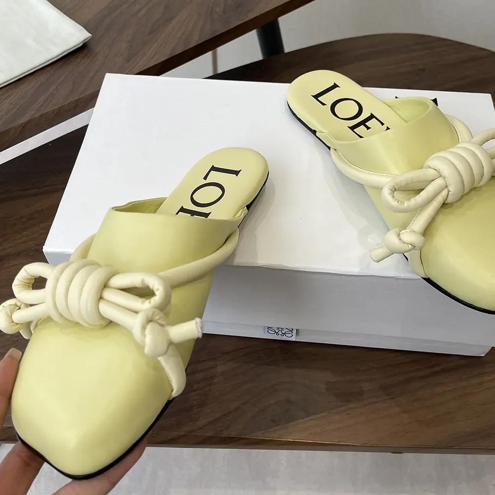 Loewe Flamenco Knot Mule in Lambskin for Women in Yellow Loewe Flamenco Knot Mule in Lambskin for Women in Yellow