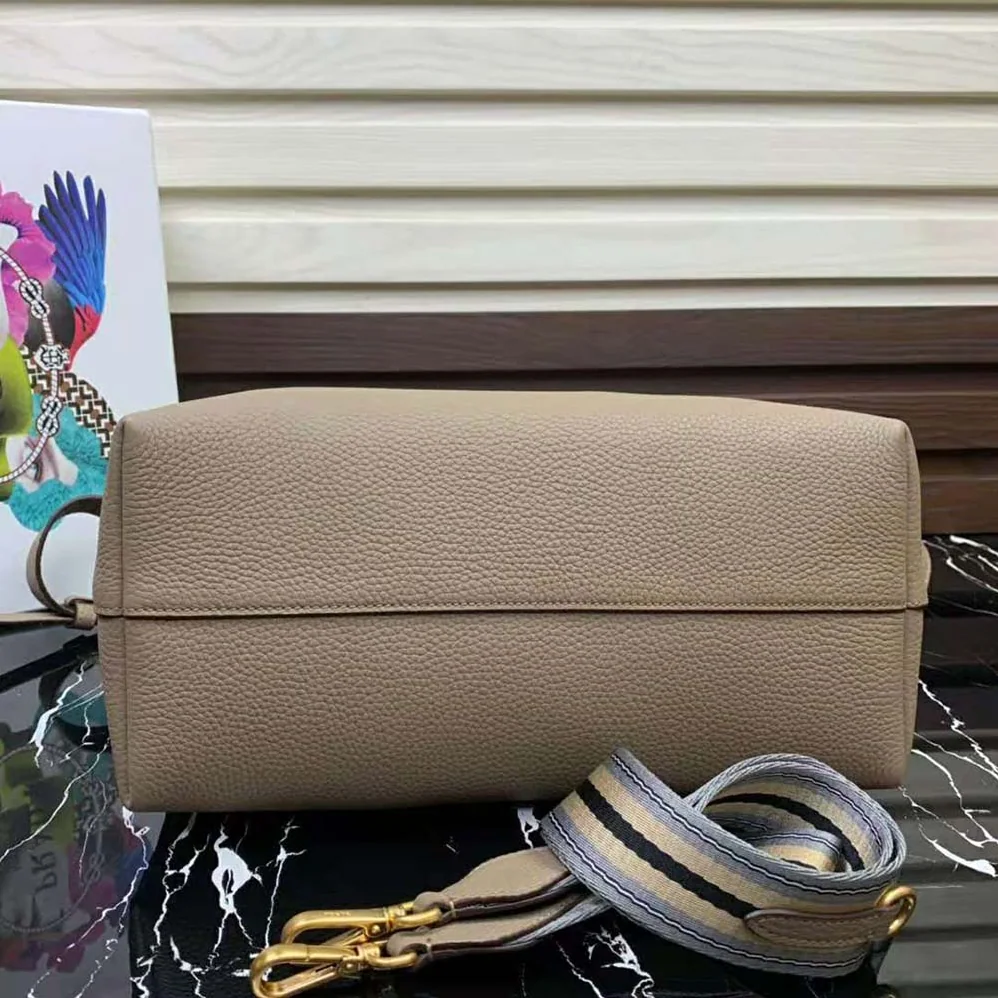 Prada Leather Handbag with Metal lettering Logo on the Front for Women in Beige Prada Leather Handbag with Metal lettering Logo on the Front for Women in Beige