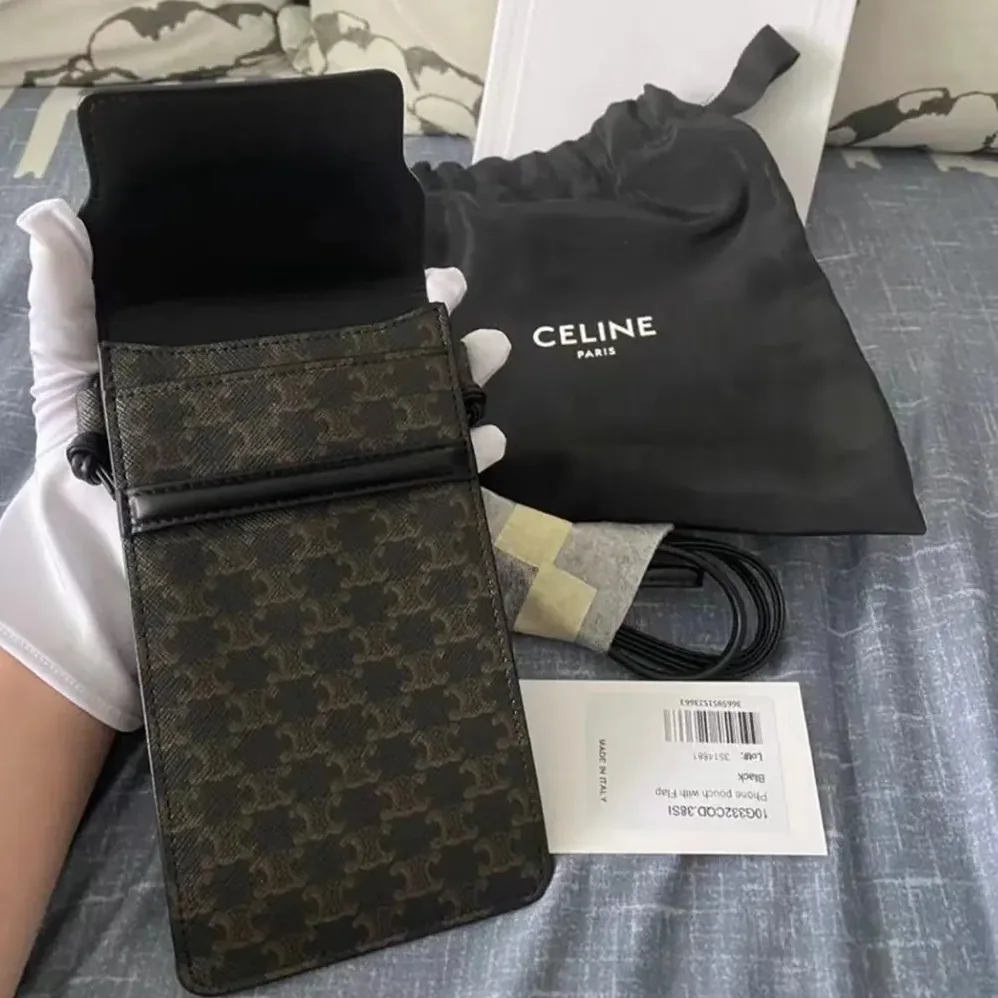 Celine Phone Pouch with Flap in Triomphe Canvas and Lambskin for Women in Black Celine Phone Pouch with Flap in Triomphe Canvas and Lambskin for Women in Black
