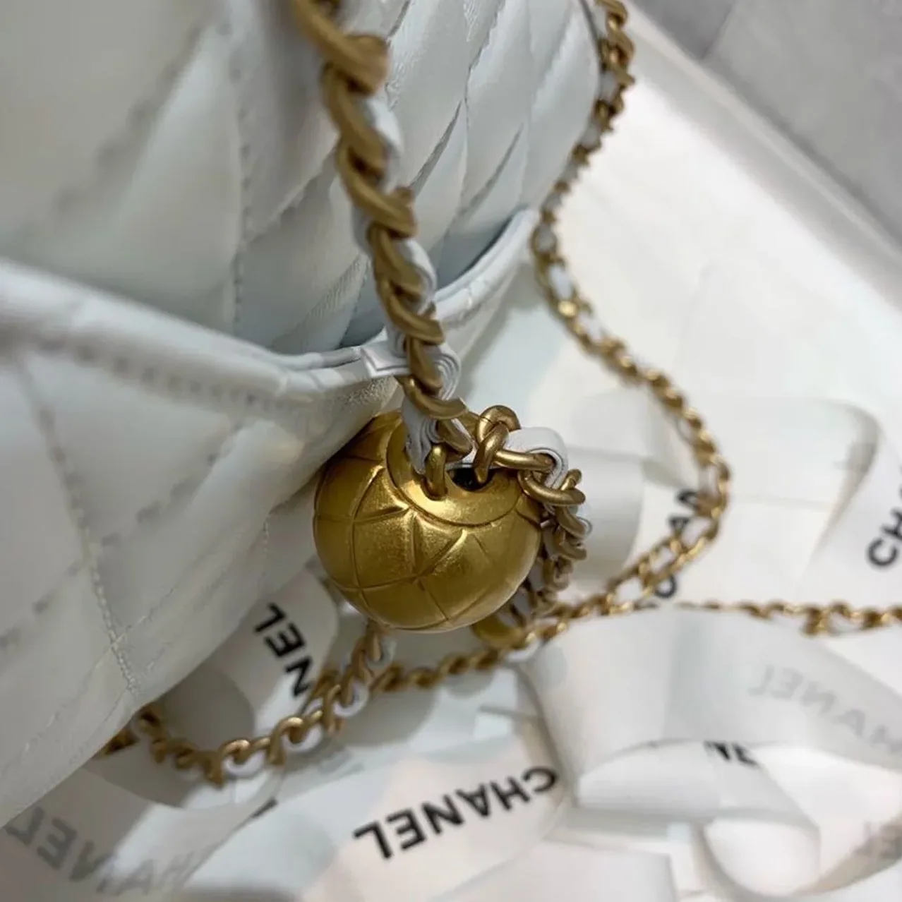 Chanel Flap Bag With CC Ball On Strap Mini Crossbody in White Gold Hardware Chanel Flap Bag With CC Ball On Strap Mini Crossbody in White Gold Hardware