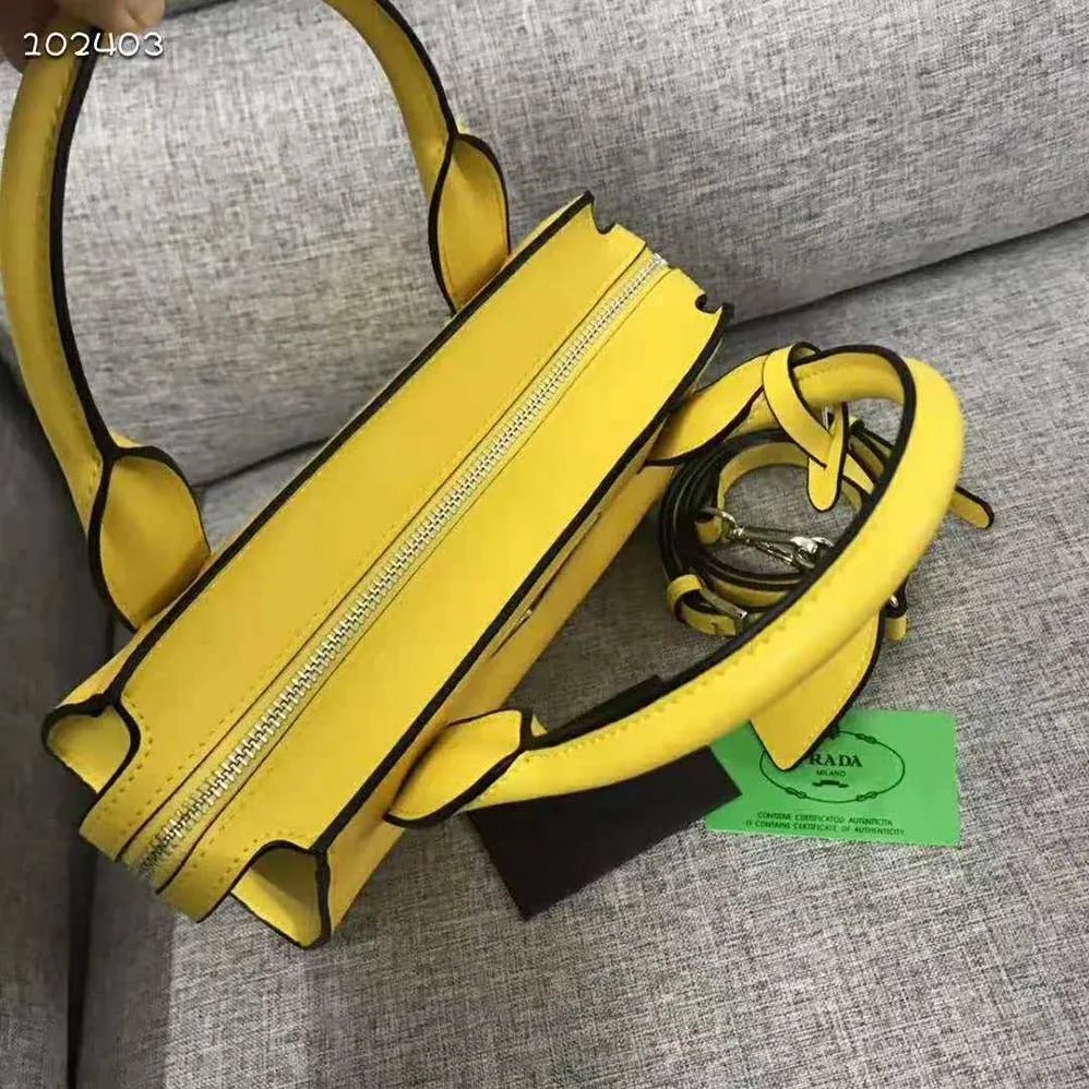 Prada Saffiano leather Prada Kristen Handbag for Women in Yellow Prada Saffiano leather Prada Kristen Handbag for Women in Yellow