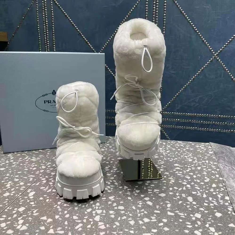 Prada Shearling Apres-ski Boots for Women in White