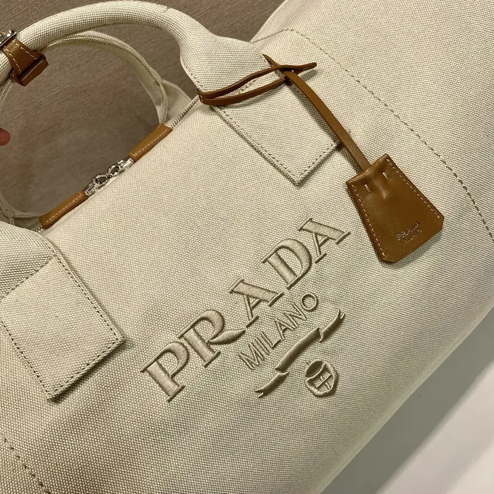 Prada Canvas Duffle Bag for Unisex in White Prada Canvas Duffle Bag for Unisex in White