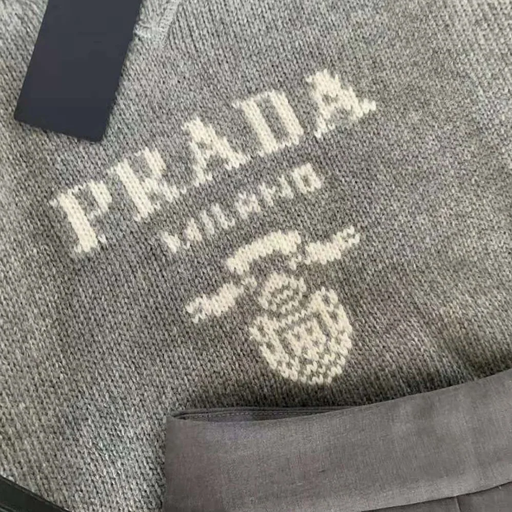 Prada Cashmere and Wool Prada Logo Crew-Neck Sweater for Women in Silver Prada Cashmere and Wool Prada Logo Crew-Neck Sweater for Women in Silver