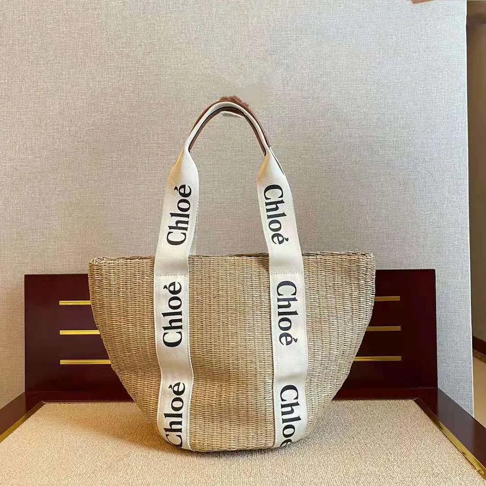 Chloe Large Woody Basket in Fair-Trade Paper with the Woody Ribbon for Women Chloe Large Woody Basket in Fair-Trade Paper with the Woody Ribbon for Women