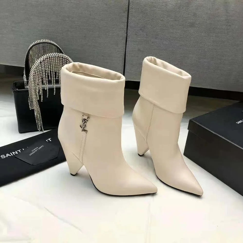 Saint Laurent YSL Niki Booties in Smooth Leather and Silver-Tone Monogram for Women in White Saint Laurent YSL Niki Booties in Smooth Leather and Silver-Tone Monogram for Women in White
