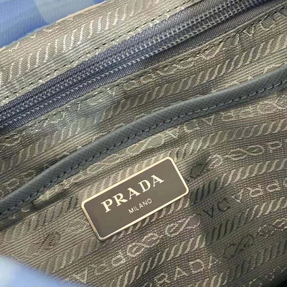 Prada Small Printed Re-Nylon Backpack for Women in Blue Prada Small Printed Re-Nylon Backpack for Women in Blue