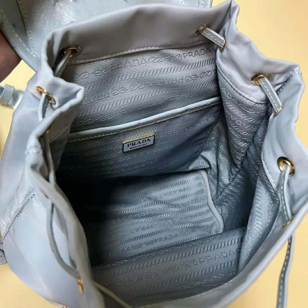 Prada Re-Nylon and Ostrich Leather Backpack for Women in Blue Prada Re-Nylon and Ostrich Leather Backpack for Women in Blue