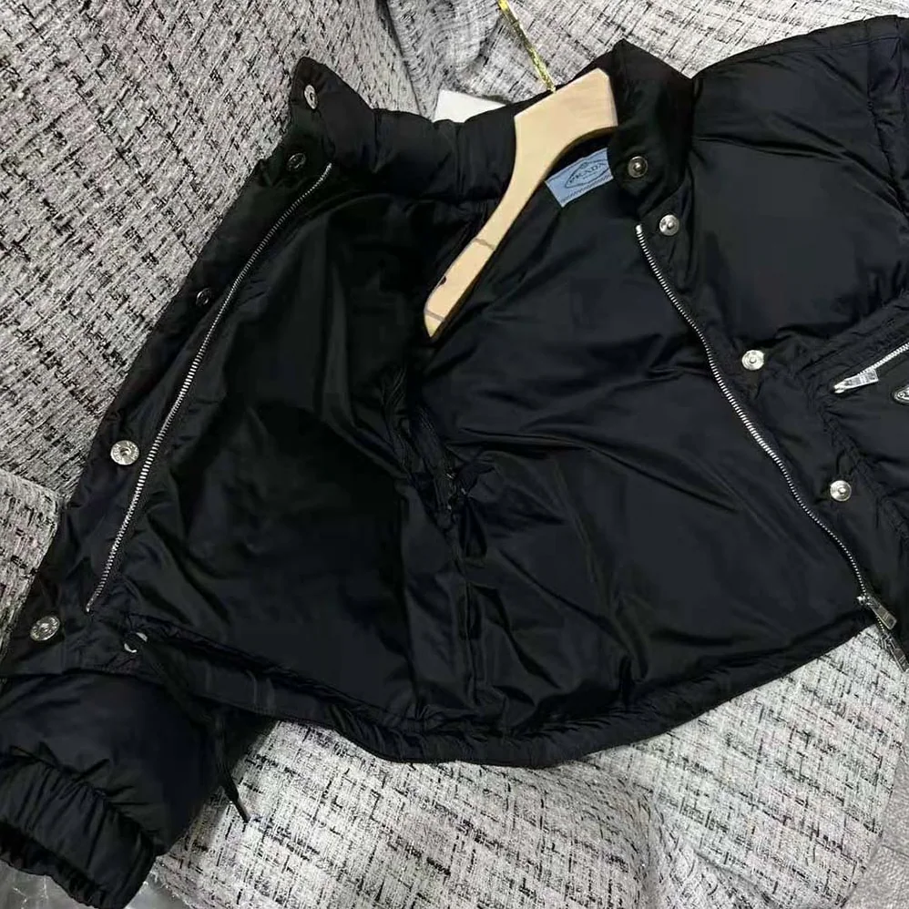 Prada Cropped Re-Nylon Down Jacket for Women in Black Prada Cropped Re-Nylon Down Jacket for Women in Black