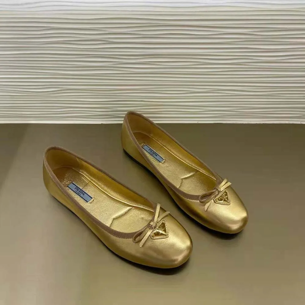 Prada Nappa Leather Ballerinas for Women in Gold Prada Nappa Leather Ballerinas for Women in Gold