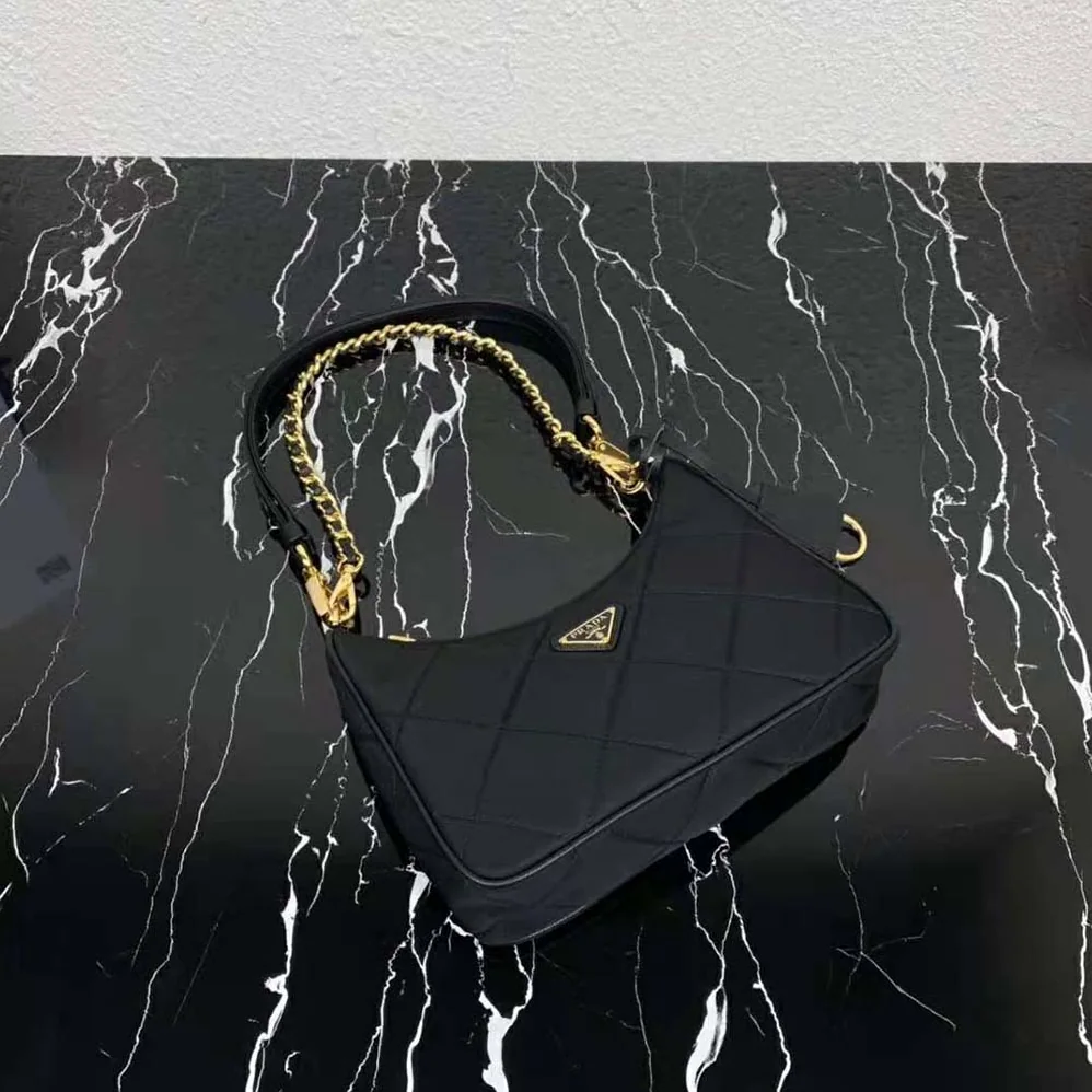 Prada Prada Re-Edition 1995 Chaîne Re-Nylon mini-bag for Women in Black
