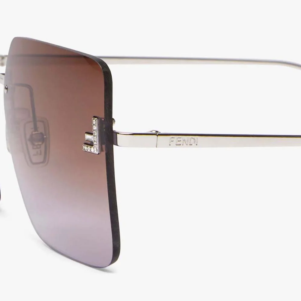 Fendi First Palladium Metal Sunglasses with Two for Women in Tone Gradient Lenses Fendi First Palladium Metal Sunglasses with Two for Women in Tone Gradient Lenses