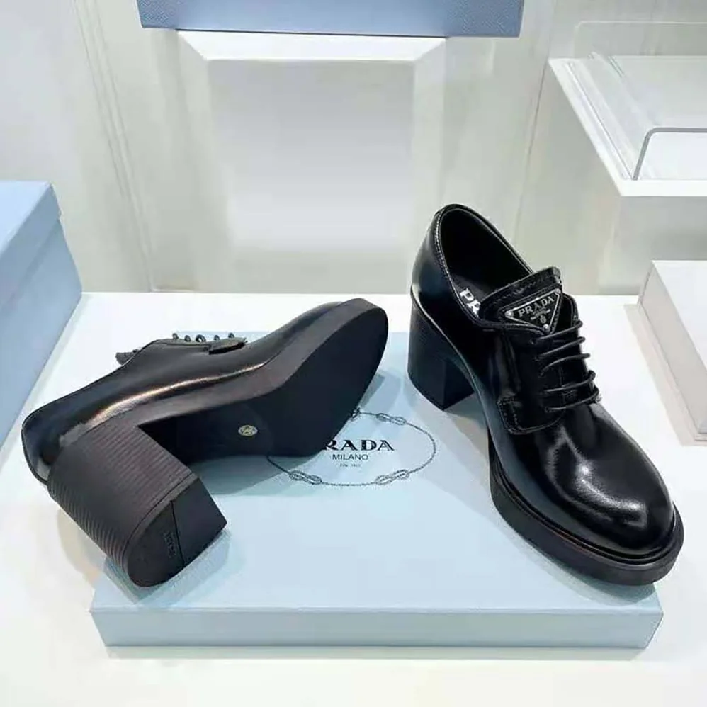Prada Heeled Brushed Leather Lace-Ups for Women in Black Prada Heeled Brushed Leather Lace-Ups for Women in Black