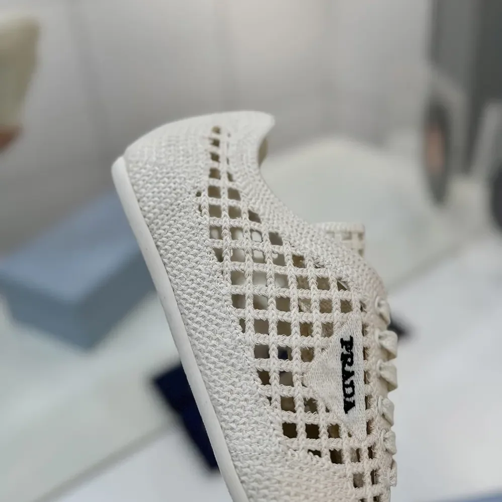 Prada Collapse Crochet Laced Sneakers for Unisex in White Prada Collapse Crochet Laced Sneakers for Unisex in White