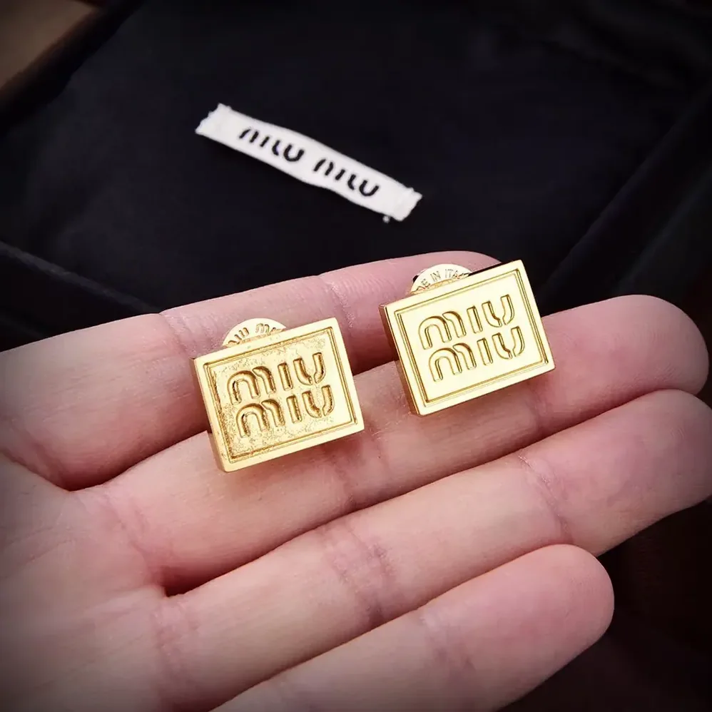 Miu Miu Metal Earrings with Visible Perforated Logo for Women Miu Miu Metal Earrings with Visible Perforated Logo for Women