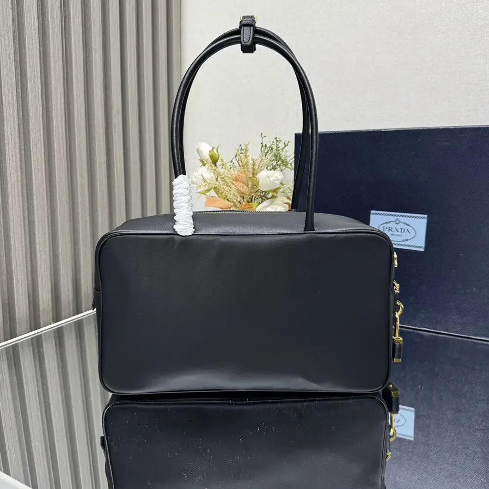 Prada Re-Nylon and Leather Medium Top for Women in handle Bag with Padlock