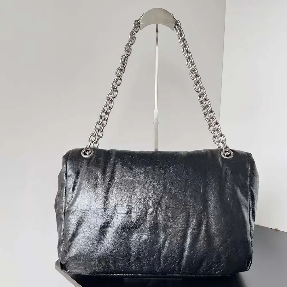 Balenciaga Monaco Large Chain Bag in Black for Women in Silver Arena Calfskin Balenciaga Monaco Large Chain Bag in Black for Women in Silver Arena Calfskin